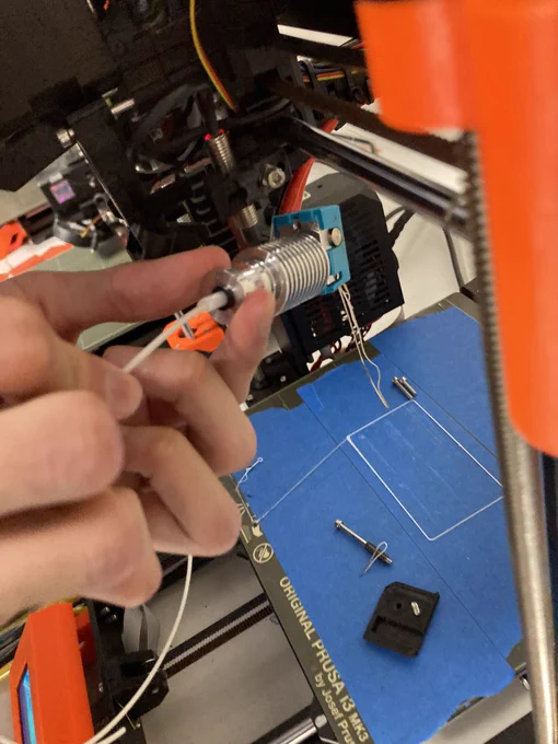 Filament being placed in to hotend that is sideways.