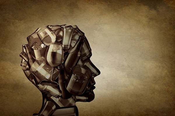 A schematic showing alcohol bottles and glasses in the shape of a person's head