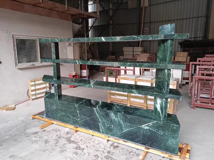 Prada store shelves. Green marble. Stone. Marble slab