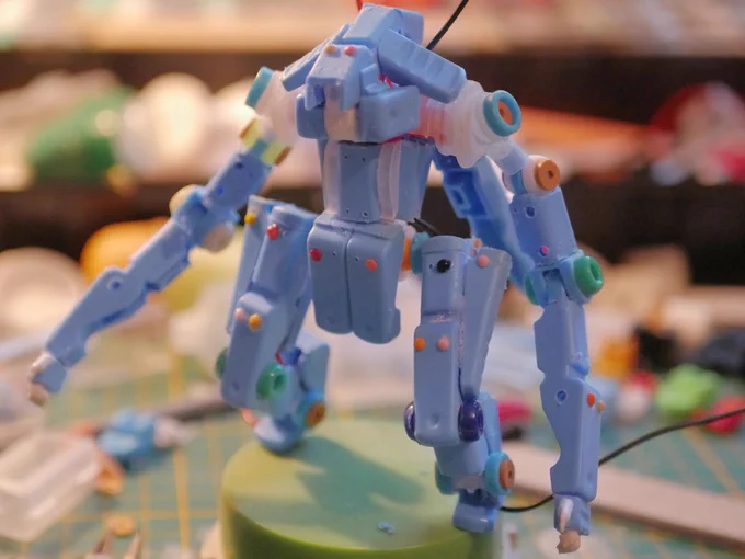 a cyclops robot made from clothespin and bead but not painted yet