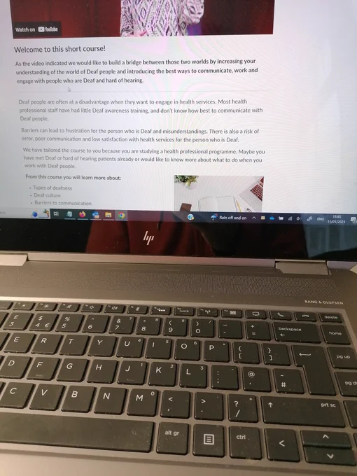 Laptop screen with a text and images