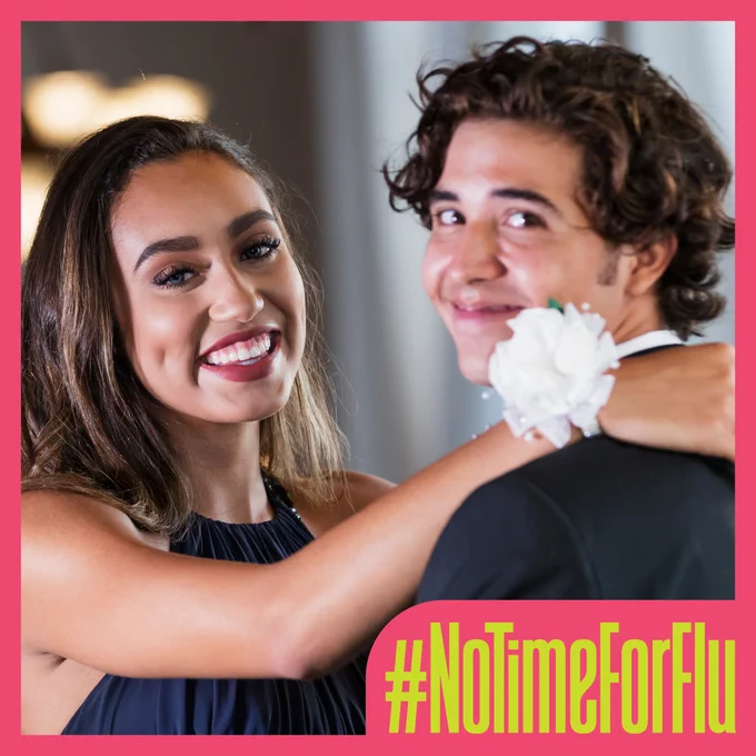 Image: two young adults smiling and dressed in semi-formal clothing
Text: #NoTimeForFlu