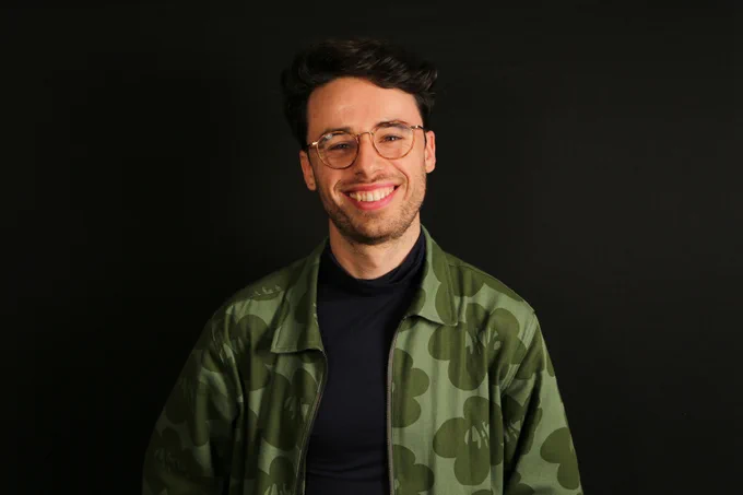 Headshot of the event speaker, Tom Bevan