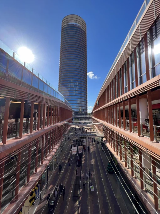 mall concourse with tower in the background