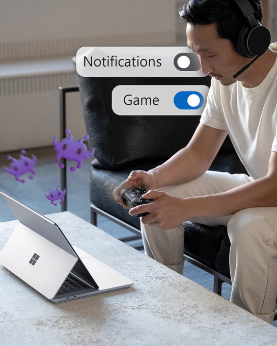 An image of a person gaming on a Surface device.