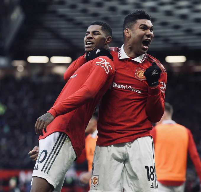 Marcus Rashford celebrates his winner with Casemiro.