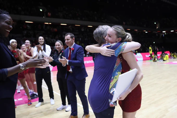 Vitality Roses captain Natalie Metcalf hugs Colette Thomson MBE