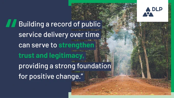 Image of Cambodian forest, accompanied by text reading "Building a record of public service delivery over time can serve to strengthen trust and legitimacy, providing a strong foundation for positive change."