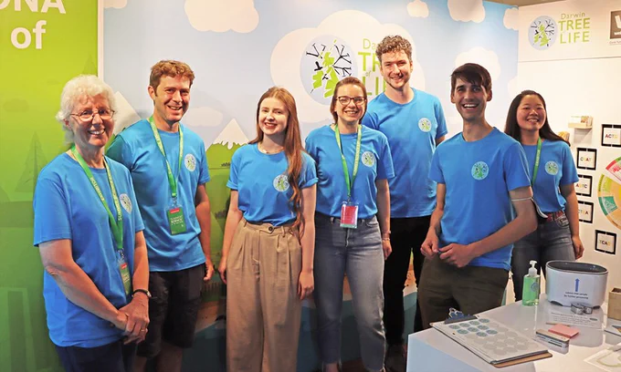 A group of people in Darwin Tree of Life t-shirts
