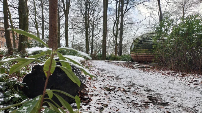 Photo of Lancaster University's LICA Pods and woodland area covered in snow