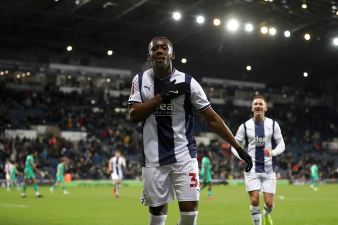 Jovan Malcolm celebrates scoring on his debut for Albion.