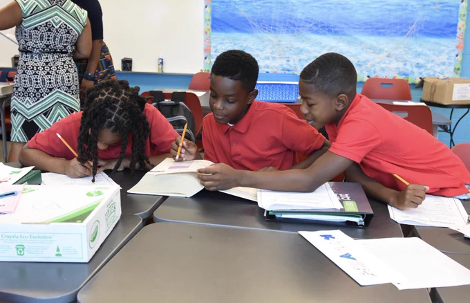 Three students at Hendley Elementary, one of DCPS’ two new Connected Schools.