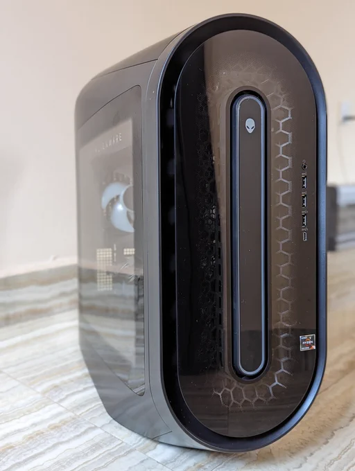 A two-point perspective image of the Alienware Aurora Ryzen Edition R14, displaying a prominent front view