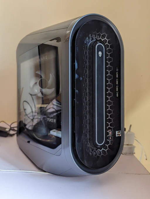 A two-point perspective close-up of the Alienware Aurora Ryzen Edition R14.