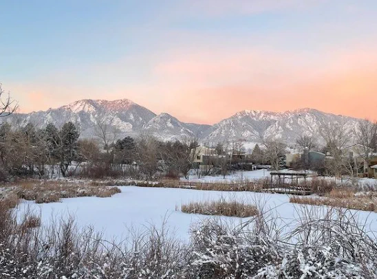 pink and blue sunrise over the foothills in boulder colorado