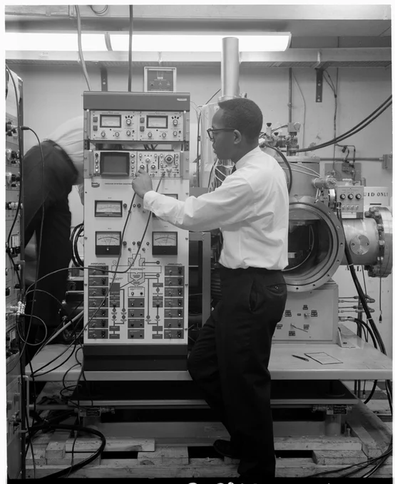 B&W image of Dr. Wade Kornegay and an unidentified colleague working with the Mass Spectrometer. 