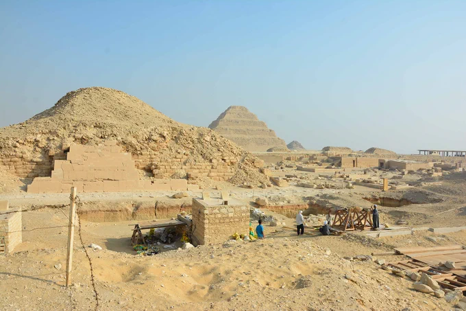 The Saqqara Saite Tombs Project excavation area, overlooking the pyramid of Unas and the step pyramid of Djoser north-west-facing. Saqqara Saite Tombs Project, University of Tübingen, Photographer: S. Beck.