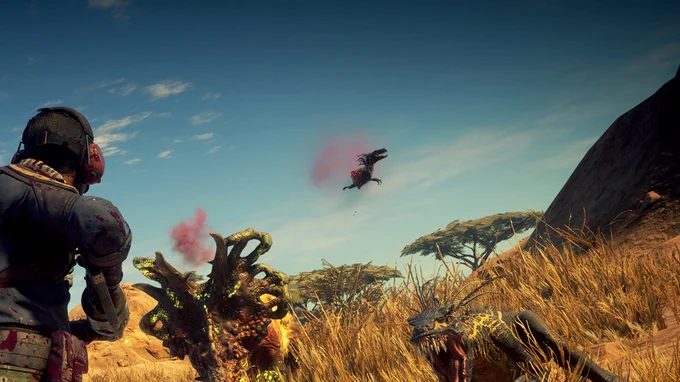 A soldier looks at a raptor and a sick looking Styracosaurus. a dino torso and head graciously soar above.