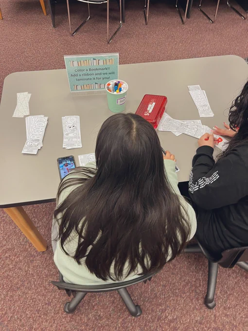 Students coloring bookmarks