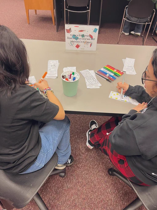 Students coloring bookmarks