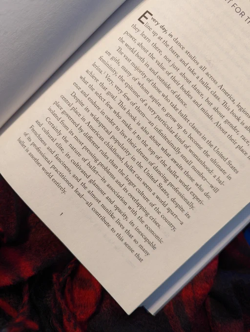 A photo of the first page of Turning Pointe, which reads, "certainly the nature of ballet–its assocation with the economic and cultural elite, its inescapable Frenchness and fanciness, and the almost nunlike lives that so many of its professional practitioners lead–all contribute to this sense that ballet is a world apart."