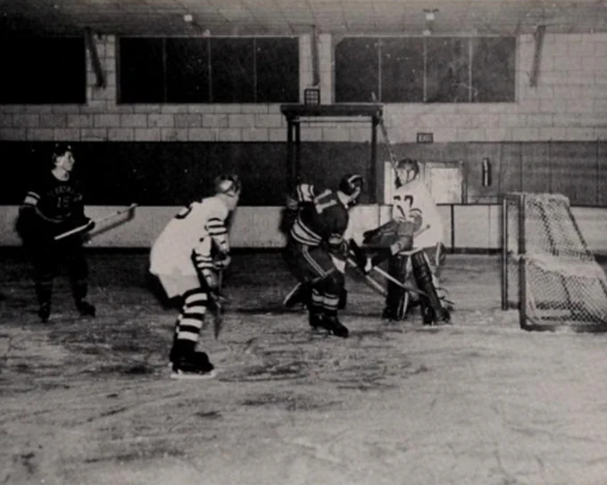 The Assumption Greyhounds men's ice hockey team competes in its inaugural season, 1956-57.
