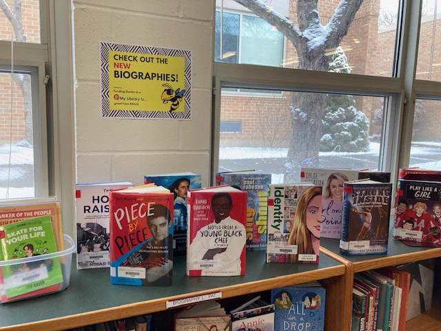 New biography books and a sign Check out the New Biographies. 