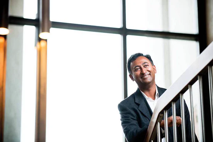 Photo of G. Sayeed Choudhury climbing a staircase.