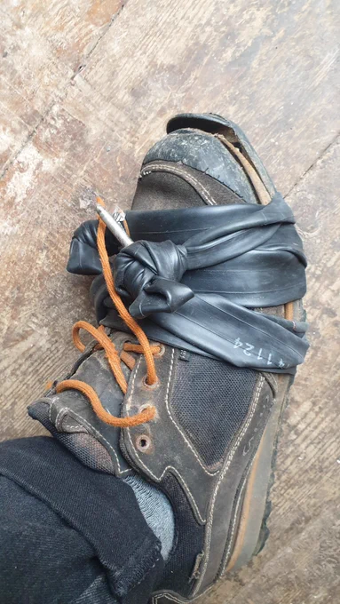 Shoe strapped up with an inner tube