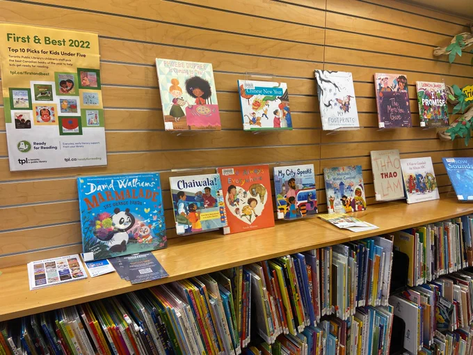 Photo of children’s books on display featuring diverse characters 