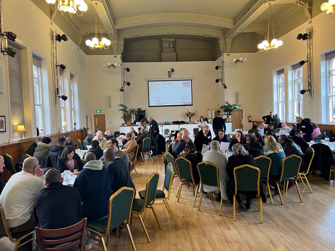 Our staff working within their teams discussing potential new ideas!