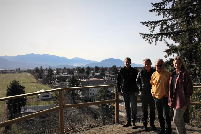Left to right: Councillors Kloot and Mercer, Mayor Popove, and Councillor Read stand at the first view point on Little Mountain Stairs overlooking the City of Chilliwack
