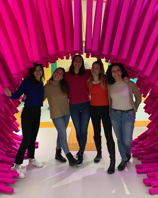 L2R: Giulia Belgiovine, Sara Mongile, Giulia Pusceddu, Francesca Cocchella, and Linda Lastrico posing underneat pink tubes at "La Città dei Bambini e dei Ragazzi"