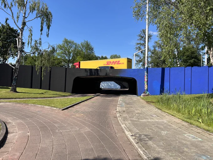 view of an underpass with a truck overhead
