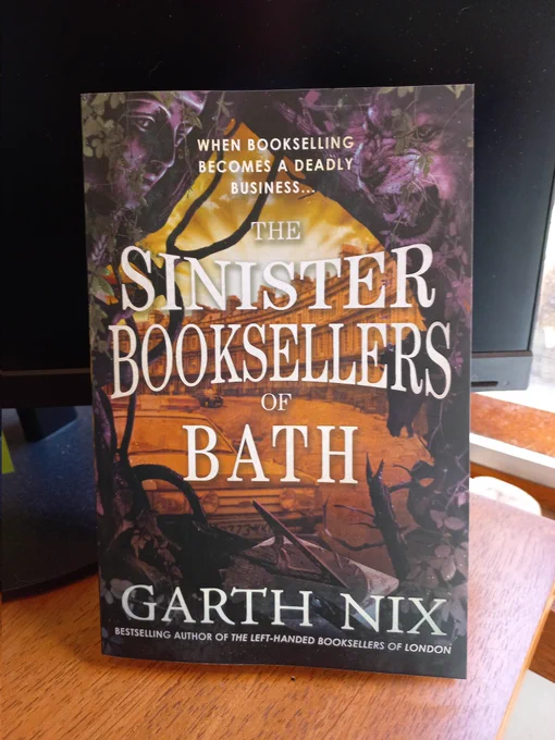 Photo shows a copy of 'The Sinister Booksellers of Bath'by Garth Nix