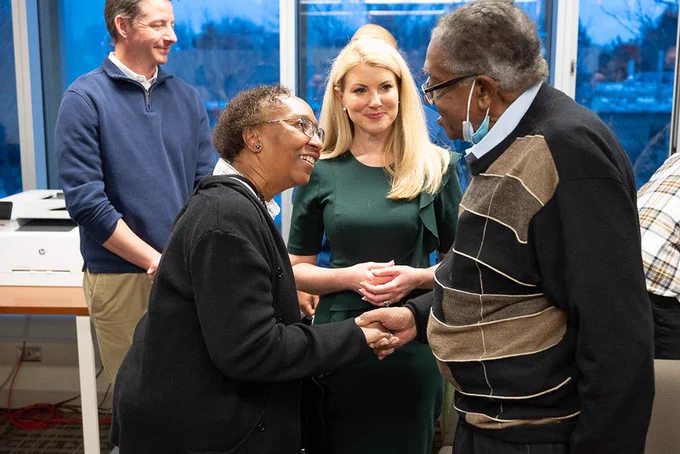 Blanche Hughes, Amy Parsons and Bobby Seale talking with one another. 