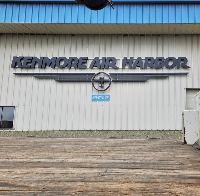 Large format sign titled: "Kenmore Air Harbor"
