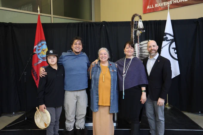 President Benoit Bacon smiles with members of Carleton's Indigenous community at today's new name launch event. 