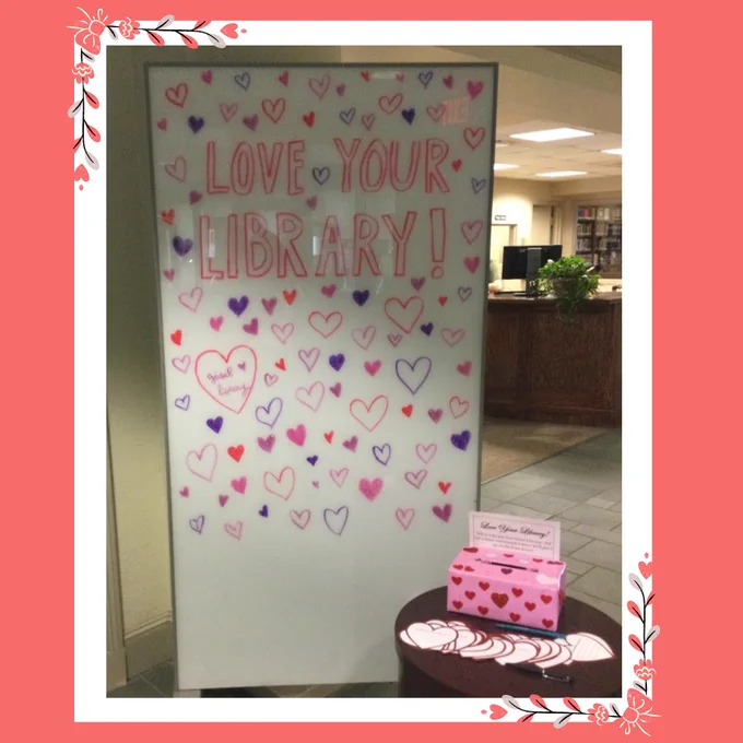 Image of a white board that reads “Love your library!”