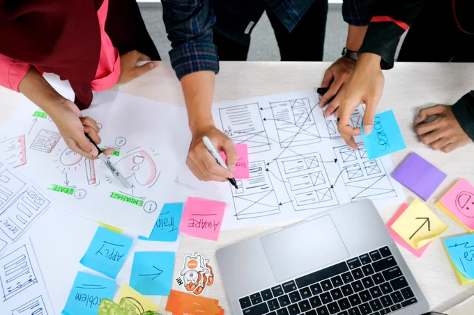 Photo of people collaborating on a design
 by UX Indonesia on Unsplash
