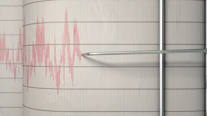 A seismograph being used to detect and record seismic waves.