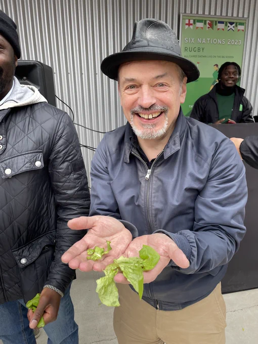 Cllr Chris Kennedy, Hackney Council Cabinet Member for Culture, holding the lucky lettuce.