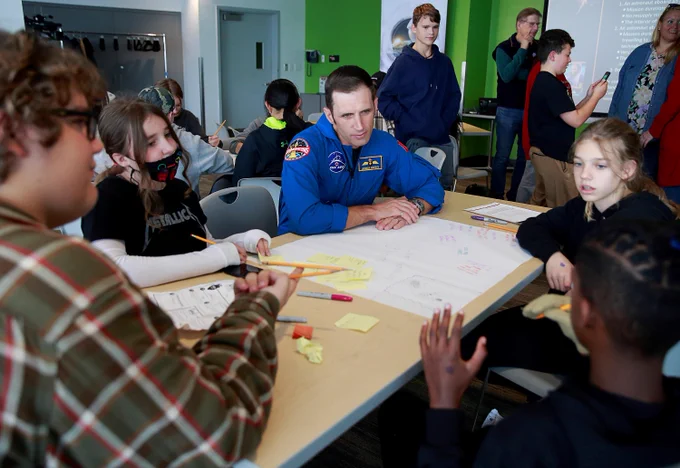 CSA astronaut Joshua Kutryk brainstorming with students.