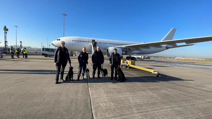 Specialist search and rescue dogs and their handlers from the UK's International Search and Rescue Team board a plane headed for Türkiye to help with the earthquake response efforts.