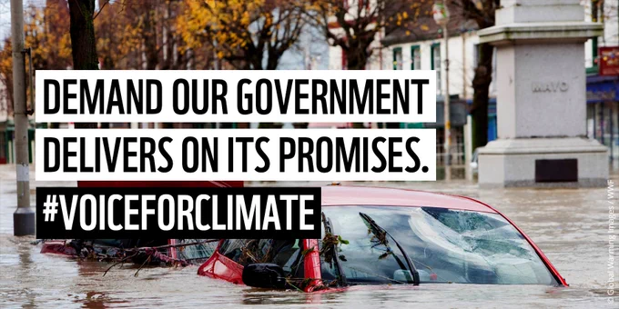 Image showing parked cars submerged in floodwater. Text reads 'Demand our government delivers on its promises. #VoiceForClimate'