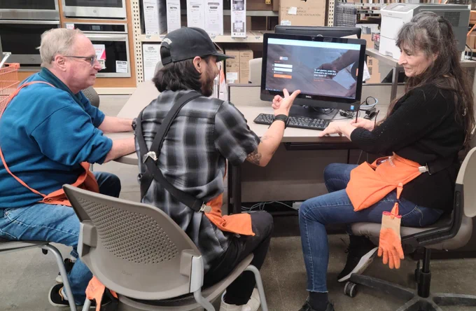Developing hardware associates , Rob, lumber and hardware department supervisor, extols importance of offering services.