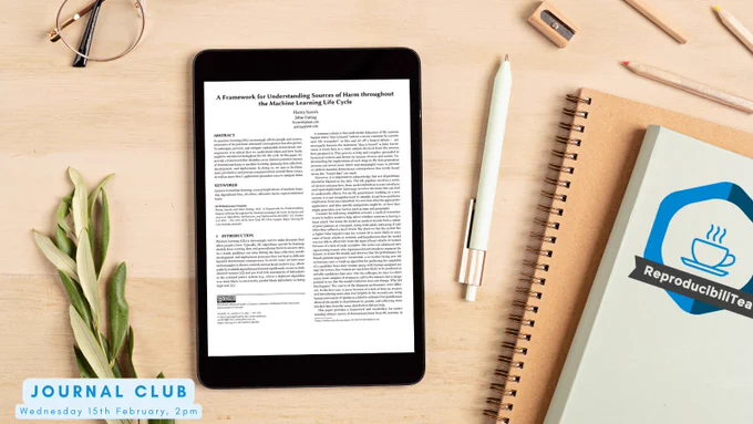 An image of a tablet computer with a picture of the paper "A Framework for Understanding Sources of Harm throughout the Machine Learning Life Cycle" on it.  The tablet computer sits on a desk of pale wood next to a pile of books - one of which has the ReproducibiliTea logo on it