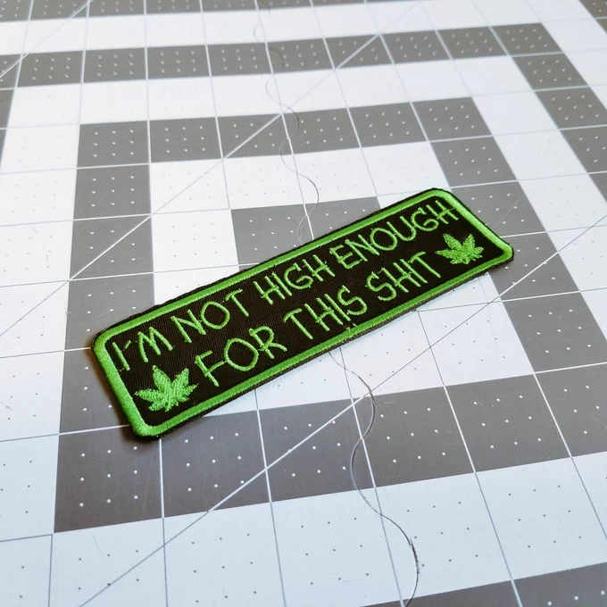 Green on black embroidered patch that says, 'I'm not high enough for this chit'.