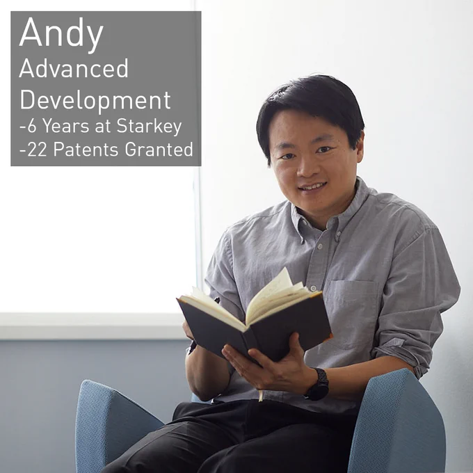 Andy from Advanced Development smiles and looks up from reading a book. He has been with Starkey for 6 years and has had 22 patents granted.