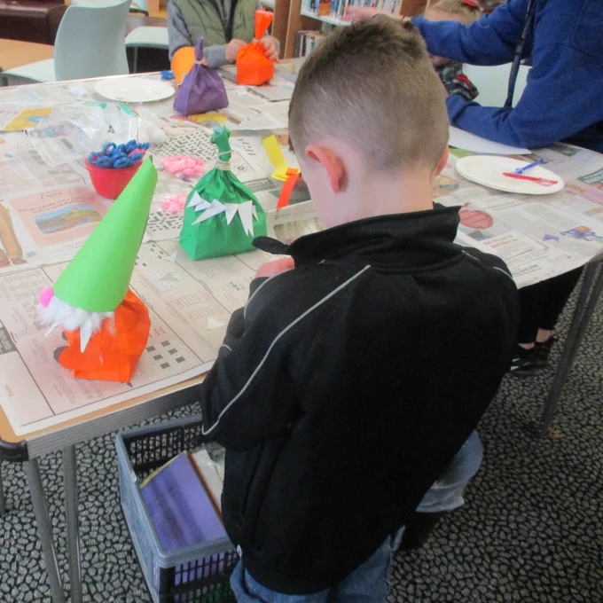 A child making  a gonk